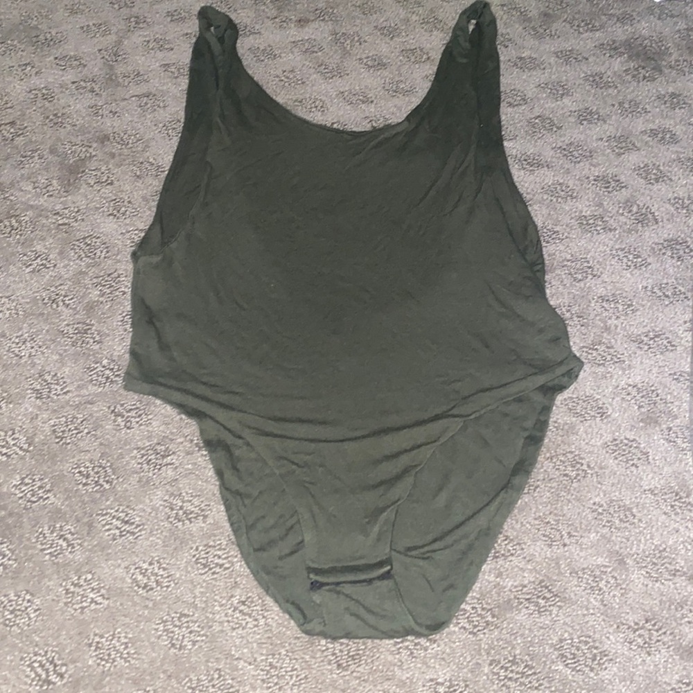 A green bodysuit